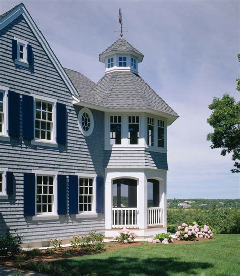 gray siding with blue shutters